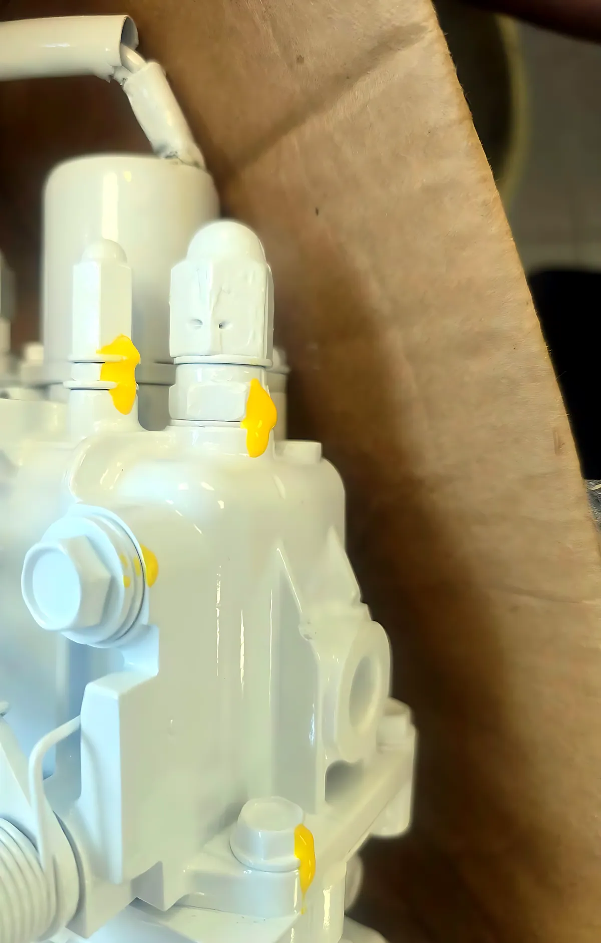 Rebuilt fuel injection pump with yellow torque-check marks